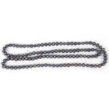 A single row of grey cultured freshwater pearls or irregular shape, 40 cm long