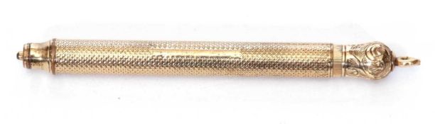 Vintage gold filled propelling pencil, the barrel with engine turned decoration, 7cm long