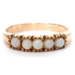 Modern five stone opal ring featuring five round cabochon opals, stamped 9ct, size M