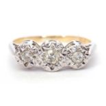 A three stone diamond ring featuring three graduated round brilliant cut diamonds, 0.33ct total