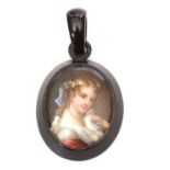 Vintage jet porcelain pendant, the oval pendant set with a hand painted porcelain panel, depicting a