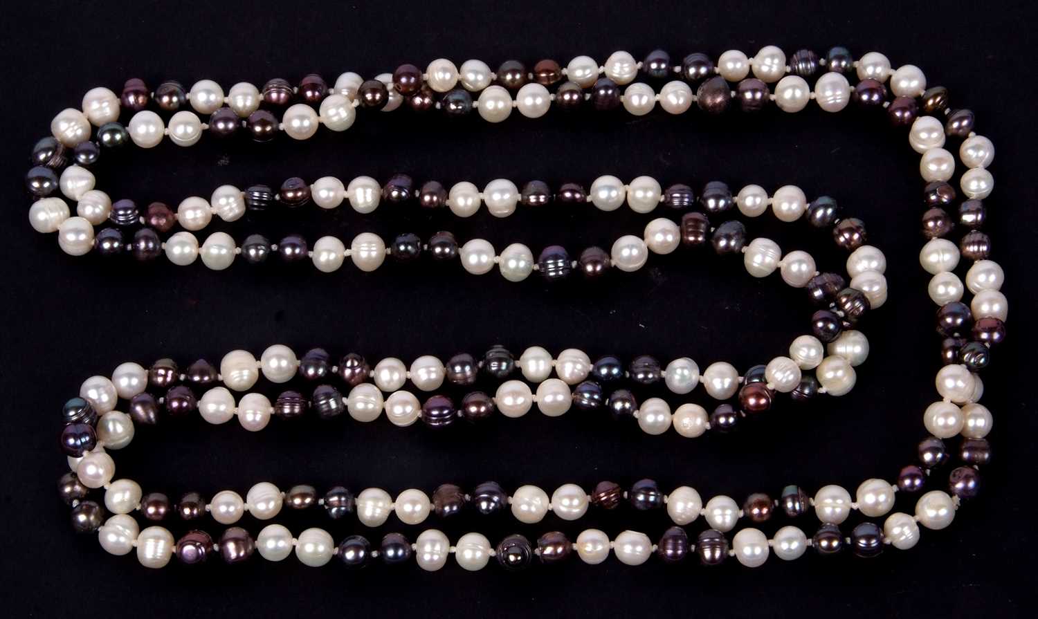 Single row of opera length mixed coloured small nugget baroque pearls, 82cm long