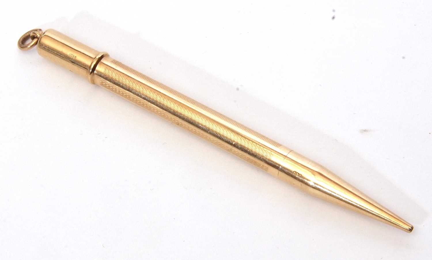 Vintage 9ct gold mechanical hallmarked pencil, the barrel engraved with a wavey line design and - Image 4 of 4