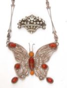 Modern large butterfly pendant necklace set with carnelian and amber beads, 8 x 7 cm together with a