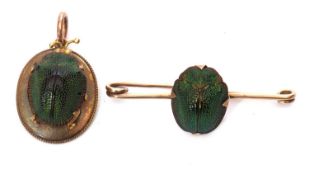 Mixed Lot: Vintage gilt metal scarab beetle pendant together with a scarab beetle brooch (2)