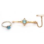 Mixed Lot: Blue topaz single stone ring, stamped 9ct, size L together with a blue stone brooch