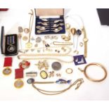 Mixed lot to include a cased EPNS set of spoons, paste brooches, service medals, bangle, simulated