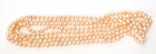 Single row of opera length fresh water cultured pearls of irregular shape, 125cm long