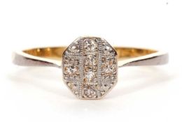 A diamond cluster ring, the oval plaque with six small single cut diamonds, panel size 7 x 6mm,
