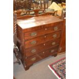 19th Century mahogany chest with four graduated drawers fitted with brass handles raised on