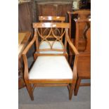 Sheraton style satinwood armchair with upholstered seat together with a matching single chair