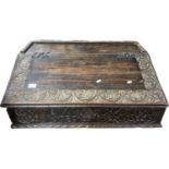 17th Century oak bible box or clerks desk of wedge form with hinged lid opening to a fitted