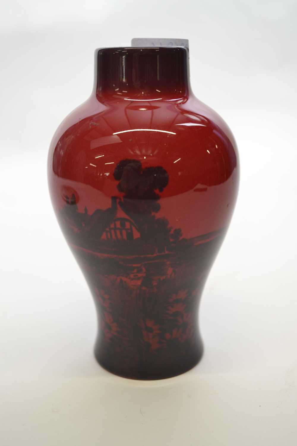 Doulton flambe vase decorated with a country cottage, 15cm high