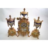 French porcelain and gilt metal mounted clock garniture of elaborate form, the clock with urn mount,