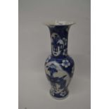 A Chinese porcelain vase Qing dynasty with Kangxi mark but probably 19th century the blue ground