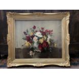 Vernon de Beauvoir (British, 20th century), still life study of flowers, oil on canvas signed and