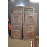 Large 17th or 18th Century Flemish oak two door wardrobe with figural carved detail (a/f)