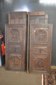 Large 17th or 18th Century Flemish oak two door wardrobe with figural carved detail (a/f)