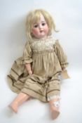 Vintage doll with blonde hair and glass eyes, marked with 5 to the rear of the bisque head