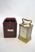 Large early 20th Century carriage clock and case with white enamel dial