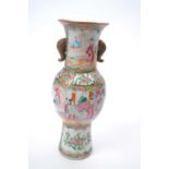 Cantonese porcelain vase decorated with polychrome designs of Chinese figures in typical settings,