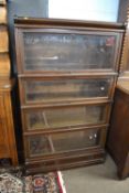 Globe Wernicke mahogany stacking bookcase cabinet formed of four glazed sections and a base