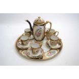 Noritaki caberet set comprising coffee pot with four cups and sauces, milk jug, sugar bowl on a