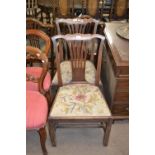 Pair of Hepplewhite period mahogany dining chairs with pierced splat backs and wool work seats