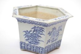 Chinese porcelain planter of hexagonal form with blue and white designs, 27cm diameter