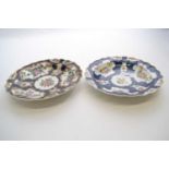 Two 18th Century Worcester plates, the blue ground decorated with floral sprays, other plate with