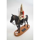 Beswick Connoisseur model of a lifeguard on a wooden oval base