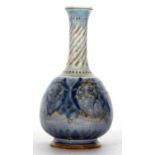 Doulton Lambeth vase by George Tabor with design of classical urns and faces on mottled blue ground,