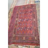 Small bokhara type wool floor rug with lozenges on a red background, 160 x 95 cm