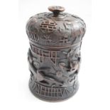 Chinese wooden cylindrical box with various carved designs and symbols including For Good Luck