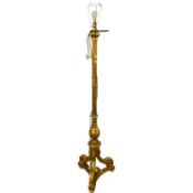 Early 20th Century ornate gilt wood standard lamp on three footed base, 185cm high including