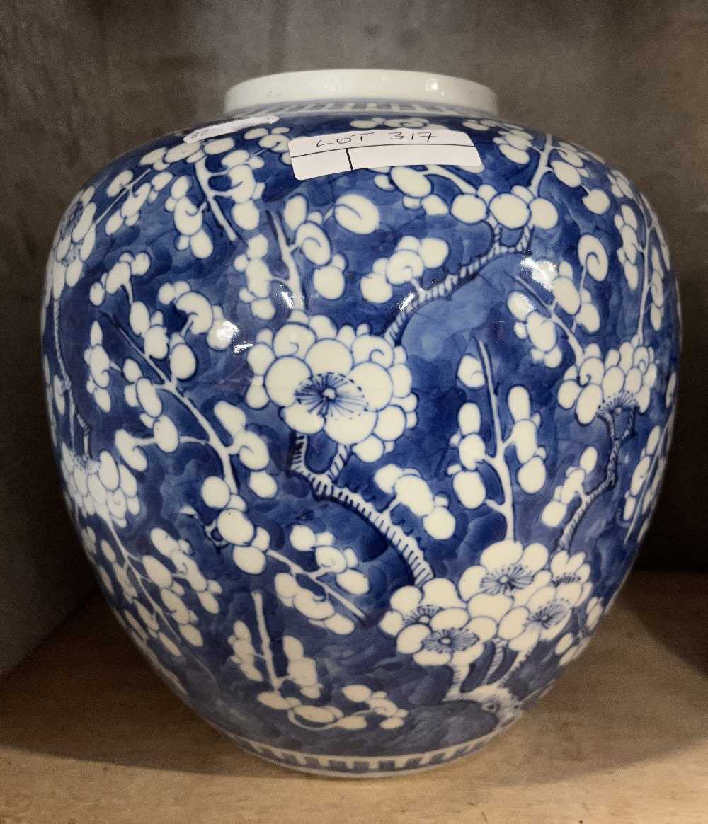 Large Chinese porcelain ginger jar decorated with prunus on a blue ground with four character mark - Image 4 of 9