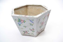 Chinese porcelain hexagonal shaped planter with famille rose designs, 26cm diameter