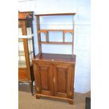 Georgian style oak dresser of small proportions with shelved top section over a base with two
