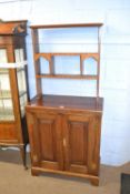 Georgian style oak dresser of small proportions with shelved top section over a base with two