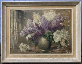 In the manner of Mary E.Oddie (British, 20th century) still life of flowers, signed Lorraine to