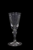 18th Century wine glass funnel bowl above a baluster stem, 14cm high