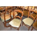 Set of six Victorian balloon back dining chairs with turned legs and stretchers