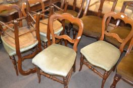 Set of six Victorian balloon back dining chairs with turned legs and stretchers