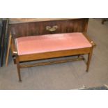 Edwardian mahogany duet piano stool with pink upholstered top,100cm wide