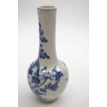 Chinese porcelain vase painted with a blue and white design of a bird amongst foliage, 23cm high