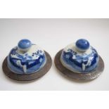 Two Chinese porcelain large ginger jar covers with blue and white designs of Chinese figures