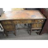 Early 20th Century William and Mary style knee hole dressing table or desk with five drawers and