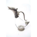 Claret jug with white metal mounts, modelled as a duck, 27cm high