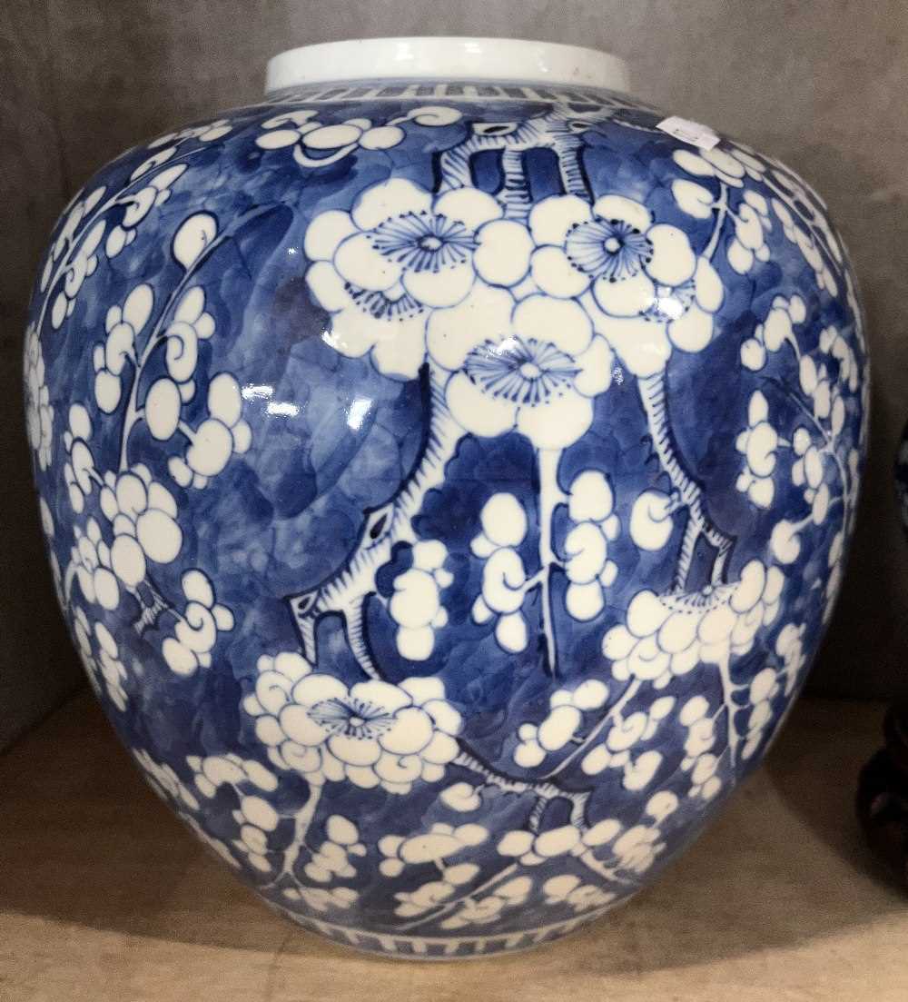 Large Chinese porcelain ginger jar decorated with prunus on a blue ground with four character mark - Image 9 of 9