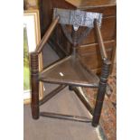 Unusual oak turners chair with ribbed arms and circular legs, 85cm high